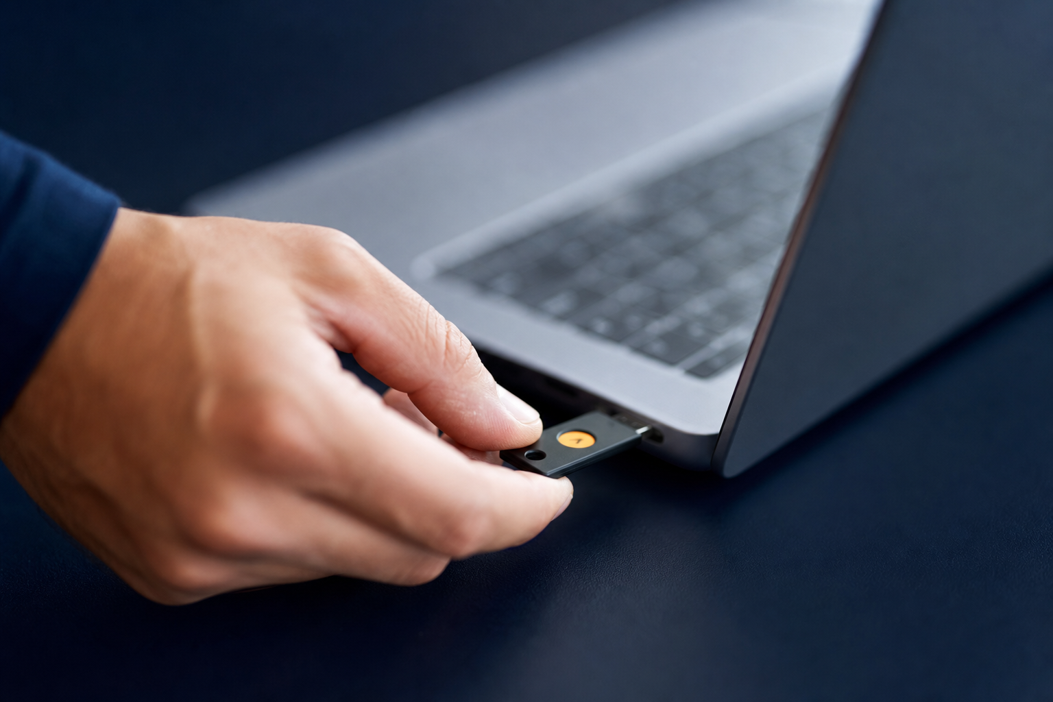 Close-up of FIDO2 security key providing phishing-resistant multi-factor authentication for small businesses